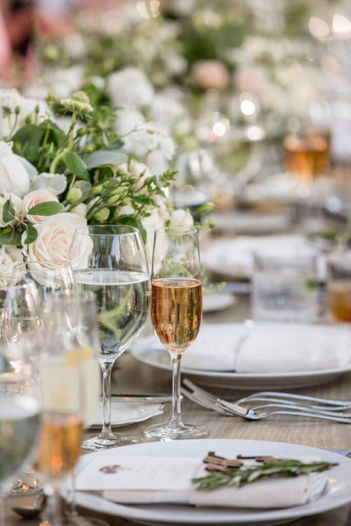 Elegant table setting with floral centerpiece and champagne glasses at Montage Healdsburg reception