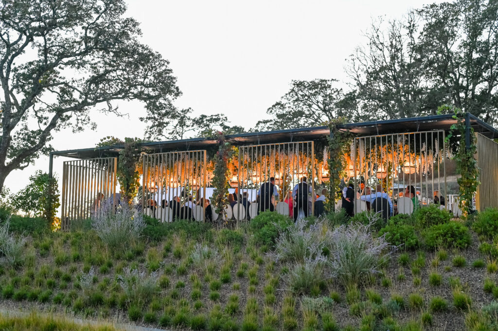 Outdoor reception space at Montage Healdsburg with warm lighting and hillside views